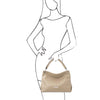 Woman Posing With The Light Taupe Handbag For Ladies