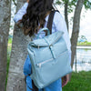 Woman Posing With The Light Blue Mens Backpack
