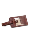 Front View Of The Brown Luggage Tag Of The 4 Wheeled Luggage And Leather Laptop Briefcase Set