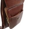 Angled Pocket View Of The Brown Leather Crossover Bag