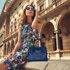 Women Posing With View Of The Navy Blue Leather Handbag With Shoulder Strap