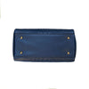 Underneath View Of The Navy Blue Leather Handbag With Shoulder Strap