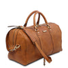 Angled View Of The Natural Leather Travel Duffel Bag
