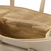 Internal Zip Pocket View Of The Light Taupe Backpack Handbag 