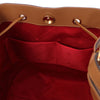 Internal Zip Pocket View Of The Cognac Bucket Handbag