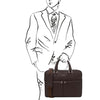 Man Holding The  Dark Brown Business Laptop Bag