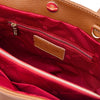 Interior view of theLeather Shoulder Bag, showcasing red lining and zip pocket, part of the Leather Shoulder Bag and Zip Around Wallet Set.