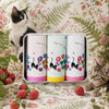 Handkerchief Ladies Gift Tin featuring three floral handkerchiefs with black cats, surrounded by strawberries and greenery.