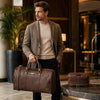 Man With The Dark Brown Leather Travel Duffle Bag and Mens Toiletry Bag Leather Set