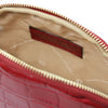 Interior view of the Croc Embossed Leather Cosmetic Case featuring gold-tone hardware and polyester lining.