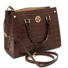 Angled And Shoulder Strap View Of The Coffee Croc Print Handbag