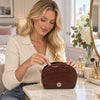Croc Embossed Leather Cosmetic Case in a chic setting, showcasing a woman organizing makeup essentials.