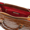 Overhead Internal Zip Pocket View Of The Cognac Croc Print Handbag