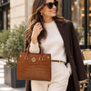 Woman Posing With The Cognac Croc Print Handbag