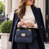 Woman Holding The Dark Blue Designer Handbag