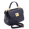 Angled And Shoulder Strap View Of The Dark Blue Designer Handbag