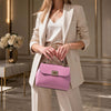 Armonia Designer Handbag in lilac, showcased with a stylish blazer outfit, exuding elegance and sophistication.