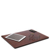 Desk Pad made of full grain leather with a tablet, glasses, and pen on a smooth surface.