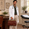Man in a doctor coat holding a Doctors Bag in a stylish office setting.