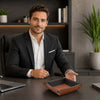 Desk Tray displayed on a modern office desk, featuring a man in a suit presenting the stylish hammered leather design.