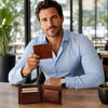 Man showcasing a Leather Mens Leather Wallet in a modern cafe setting.