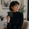 Woman Holding The Black Exclusive Leather Wallet