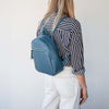 Woman Posing With Denim Genuine Leather Backpack
