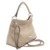 Angled And Shoulder Strap View Of The Light Taupe Handbag For Ladies