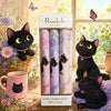 Hankies Box Of 3 Cats With Floral Design featuring black cats, floral patterns, and a pink mug in a whimsical setting.