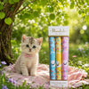 Hankies Box Of 3 White Cats Design displayed next to an adorable kitten in a sunny garden.