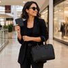Woman Inside A Shopping Centre With The Black Italian Leather Bag and Wallet Set