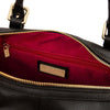 Close-up of the interior of a Black  Italian leather duffle bag, showing a beige patterned lining, open pocket and gold-tone hardware.