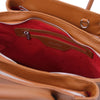 Internal Zip Pocket View Of The Cognac Italian Leather Handbag