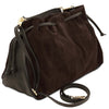 Angled And Shoulder Strap View Of The Chocolate Italian Suede Drawstring Shoulder Bag