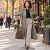 Woman In The Street Carrying  The Chocolate Italian Suede Leather Bucket Bag