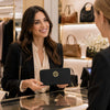 Woman In A Store With The Black Italian Leather Wallet