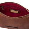 Interior view of Leather Clutch Bag for Women showcasing rich red lining and brand label.