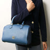 Woman Posing With The Denim Ladies Leather Duffle Bag