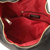 Internal Zip Pocket View Of The Black Ladies Pebbled Leather Hobo Bag