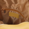 Internal Zip Pocket View Of The Pastel Yellow Ladies Small Leather Backpack