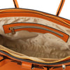 Internal Zip Pocket View Of The Orange Ladies Handbag
