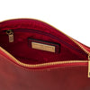 Interior view of Leather Clutch Bag for Women in red showcasing rich red lining and brand label.