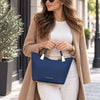 Woman In The Street Holding The Dark Blue Ladies Leather Tote Handbag