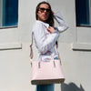 Over The Shoulder View Of A Women Posing With The Ballet Pink Ladies Small Leather Handbag
