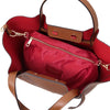 Womens Leather Shopping Bag and Toiletry Bag Set featuring a spacious design and interior toiletry pouch in vibrant red.