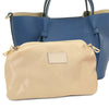 Womens Leather Shopping Bag and Toiletry Bag Set featuring a spacious denim shopping bag and a beige toiletry pouch.