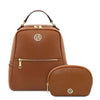 Leather Backpack and Toiletry Bag Set featuring a cognac backpack and matching toiletry pouch.