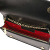 Interior view of the Leather Chain Clutch Bag showing red lining and gold chain.