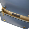 Interior view of the Leather Chain Clutch Bag showcasing the gold chain and compartments.