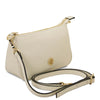Leather Clutch Bag in beige color with adjustable strap and gold detailing.
